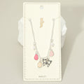 Silver-tone butterfly charm anklet with pink teardrop accents and pale round beads.