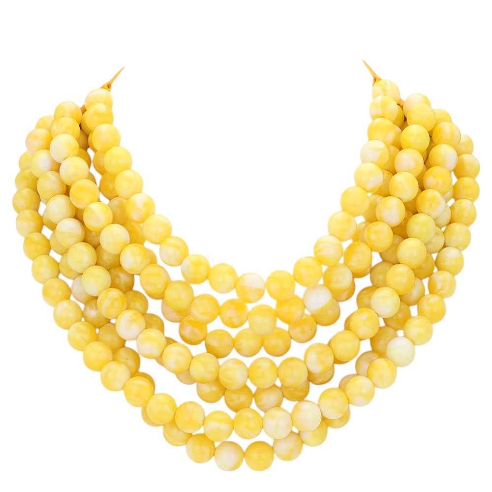 Chunky multi-strand beaded statement necklace shown in an additional colorway on a display form