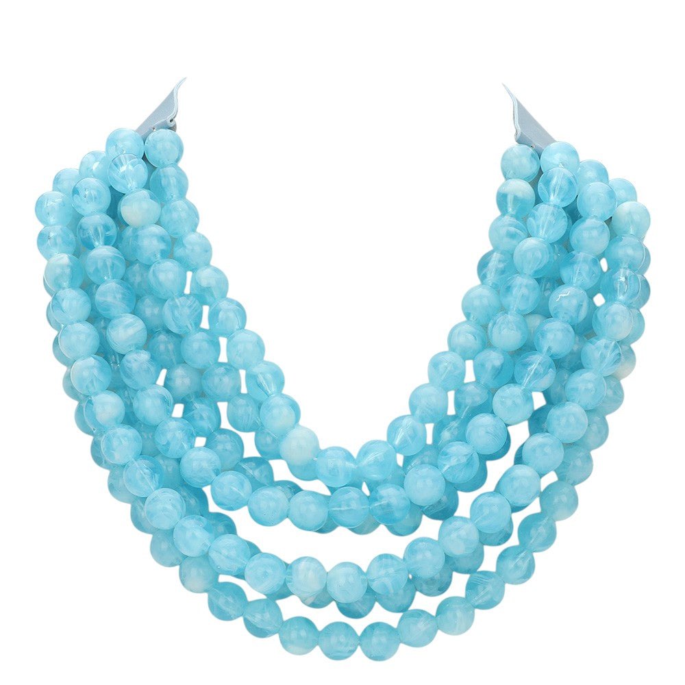 Chunky multi-strand beaded statement necklace shown in an additional colorway on a display form