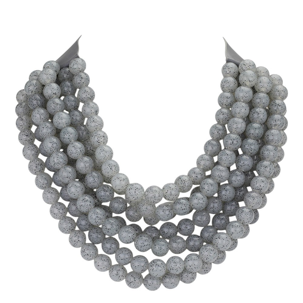 Chunky multi-strand beaded statement necklace shown in an additional colorway on a display form