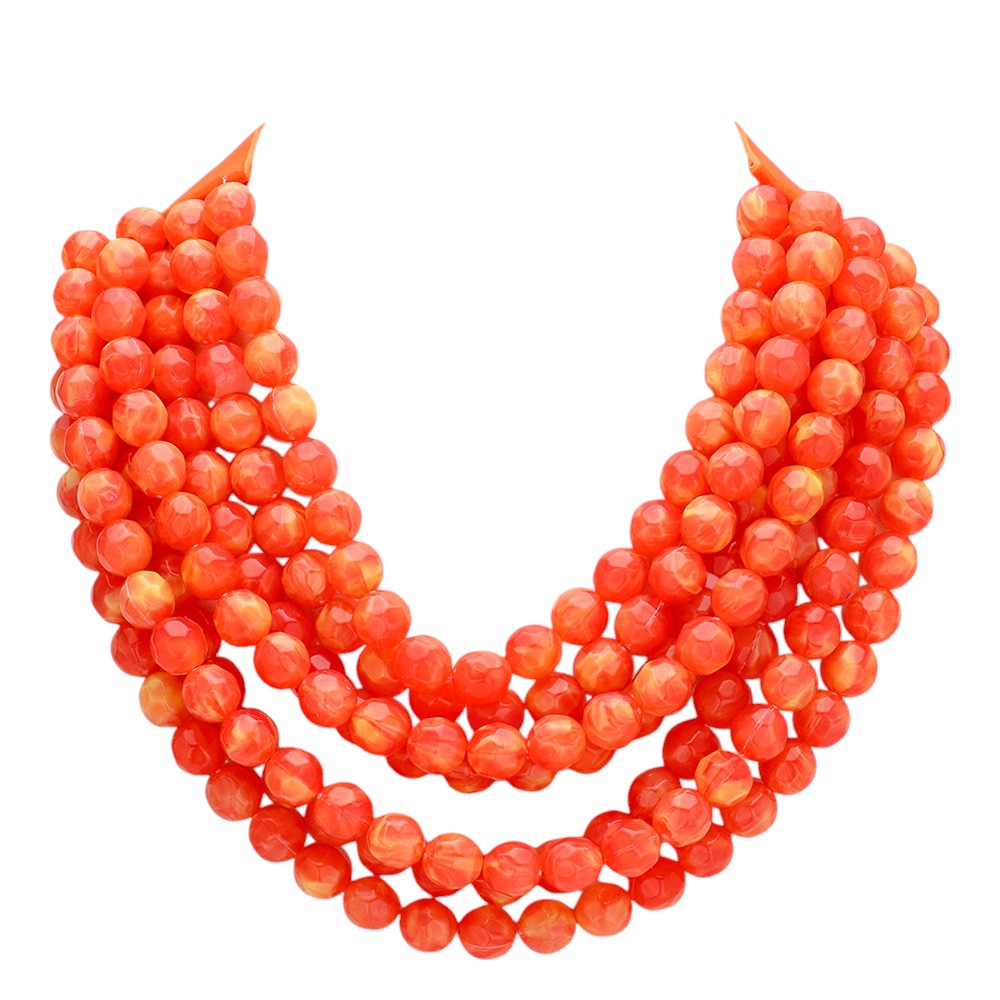 Chunky multi-strand beaded statement necklace shown in an additional colorway on a display form
