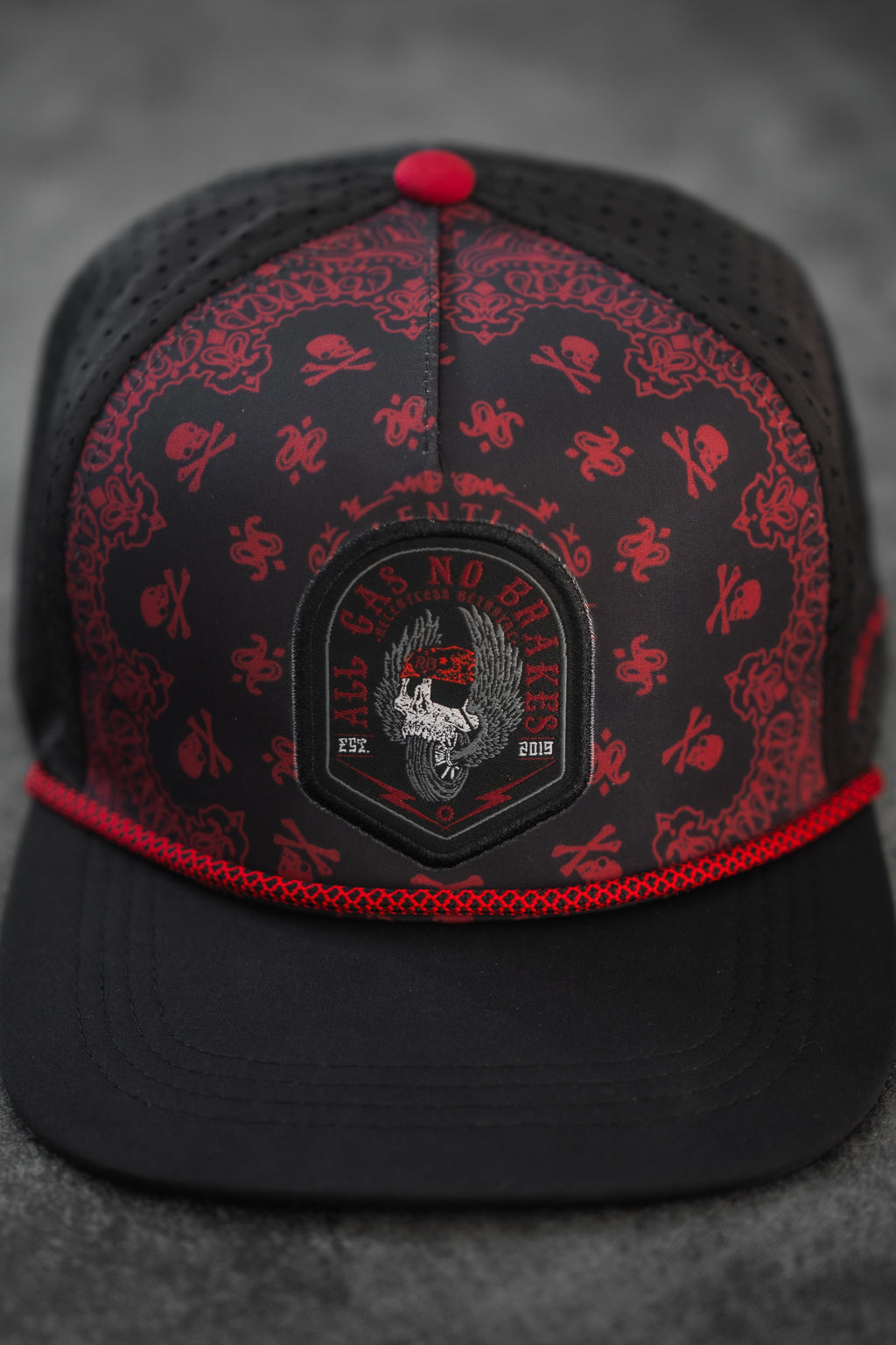 All Gas No Brakes Premium Snapback: black cap with red bandana-style print, skull patch and red rope trim, front product view.