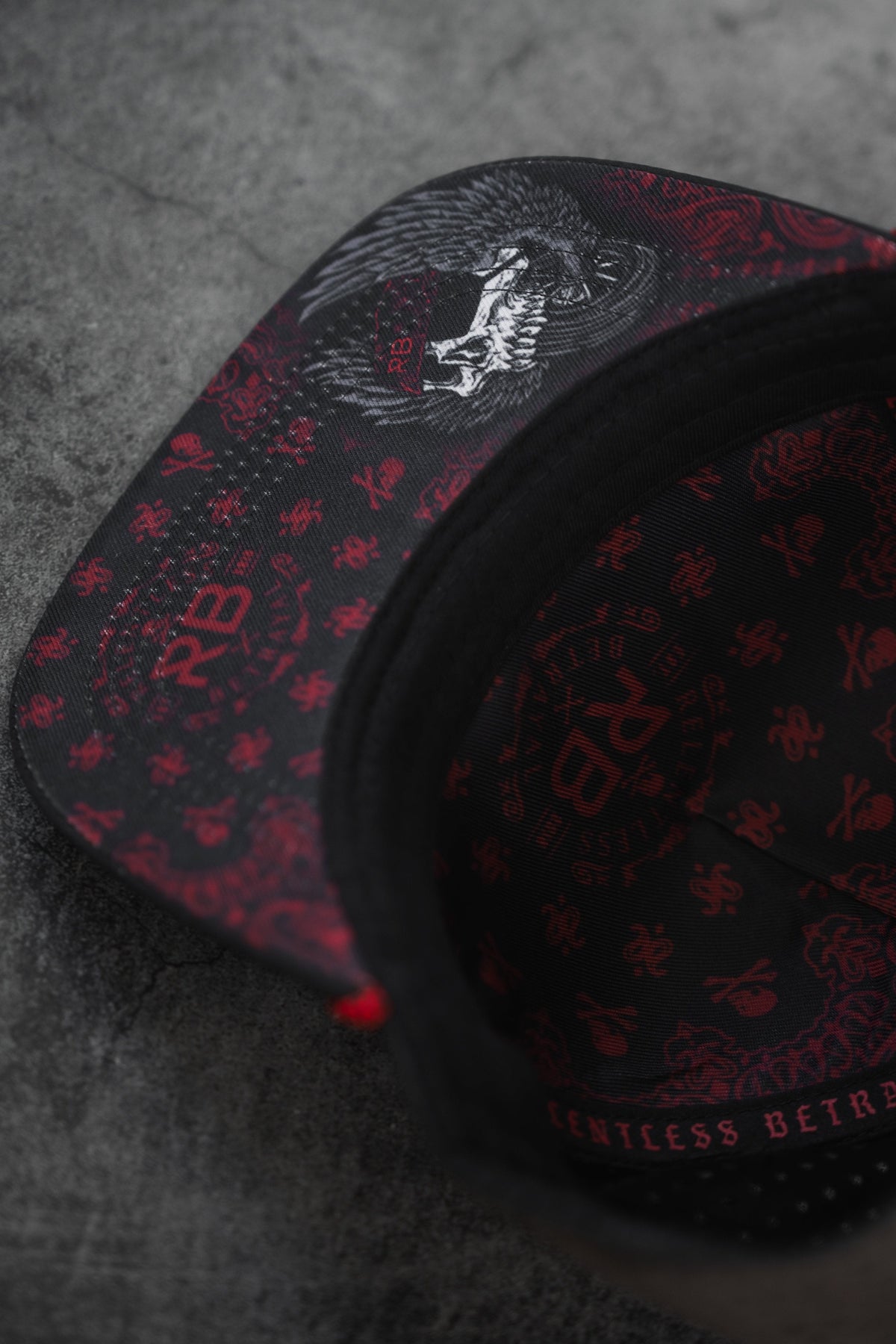All Gas No Brakes Premium Snapback: black cap with red bandana-style print, skull patch and red rope trim, underside artwork detail.