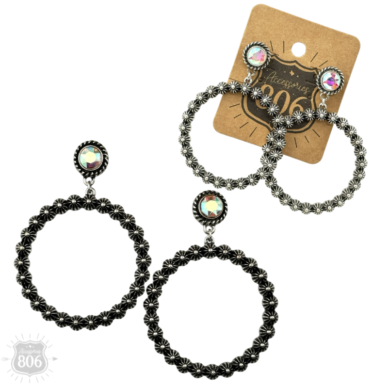 Close-up of the iridescent-cut stud and silver-tone beaded hoop earring on a hang tag