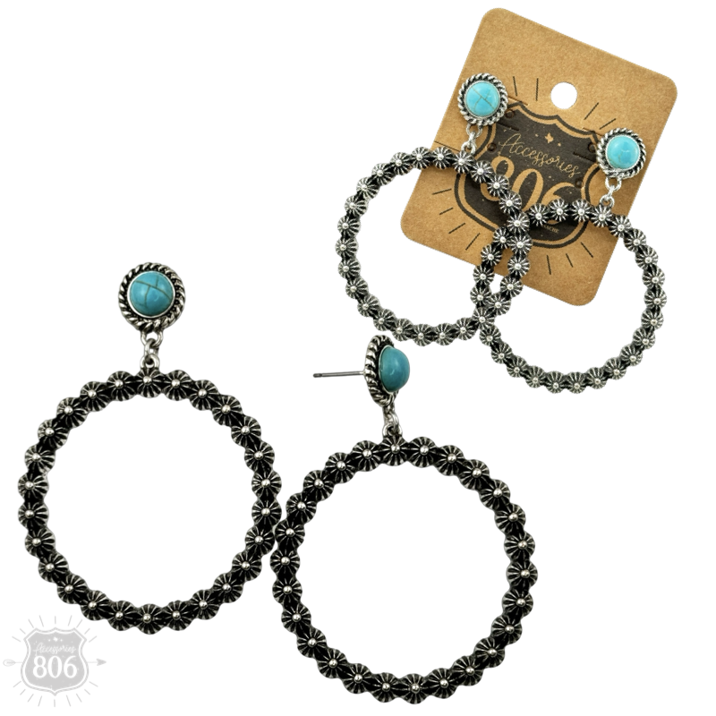 Close-up of the turquoise-color stud and silver-tone beaded hoop earring on a hang tag