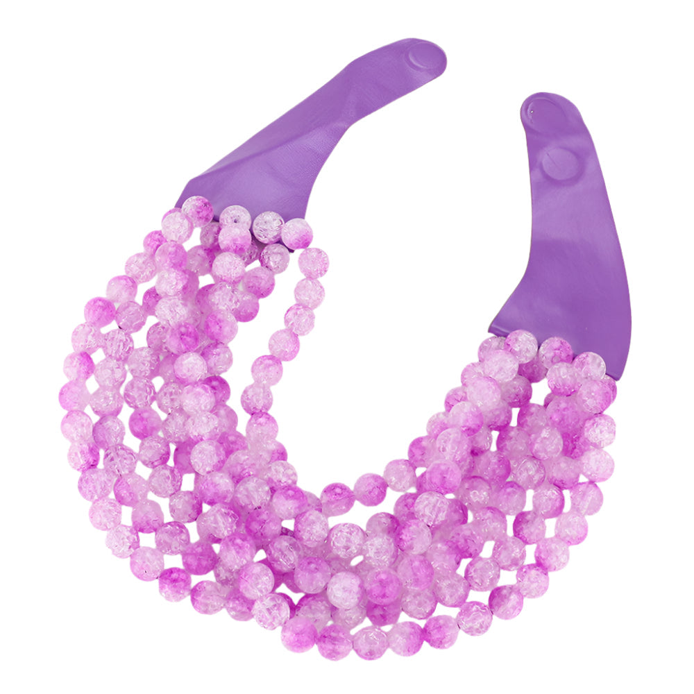 Chunky multi-strand beaded statement necklace shown in an additional colorway on a display form