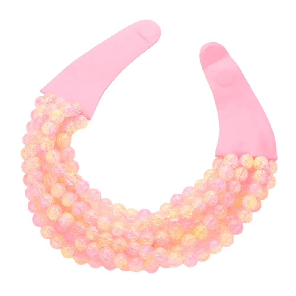 Chunky multi-strand beaded statement necklace shown in an additional colorway on a display form
