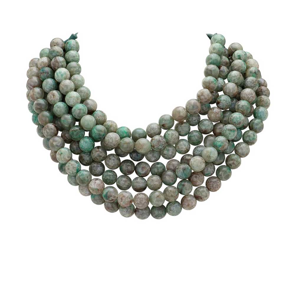 Chunky multi-strand beaded statement necklace shown in an additional colorway on a display form