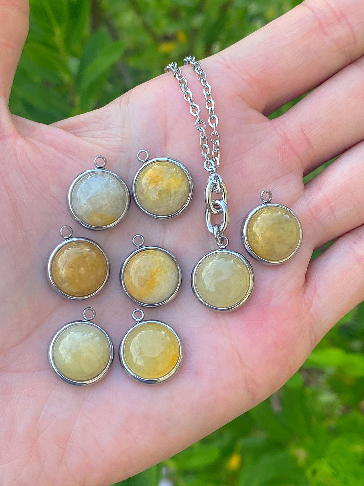 Additional product photo of the Layered Stone Charm Necklace showing the round stone pendant on a fine chain