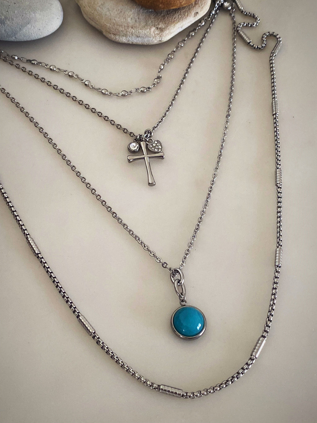 Additional product photo of the Layered Stone Charm Necklace showing the round stone pendant on a fine chain