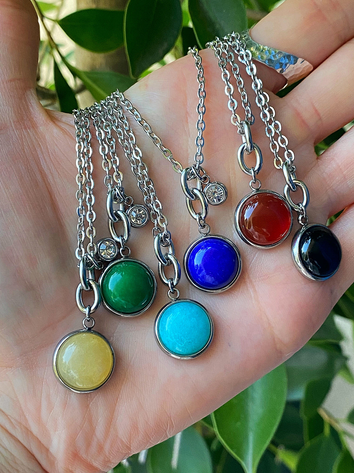 Additional product photo of the Layered Stone Charm Necklace showing the round stone pendant on a fine chain