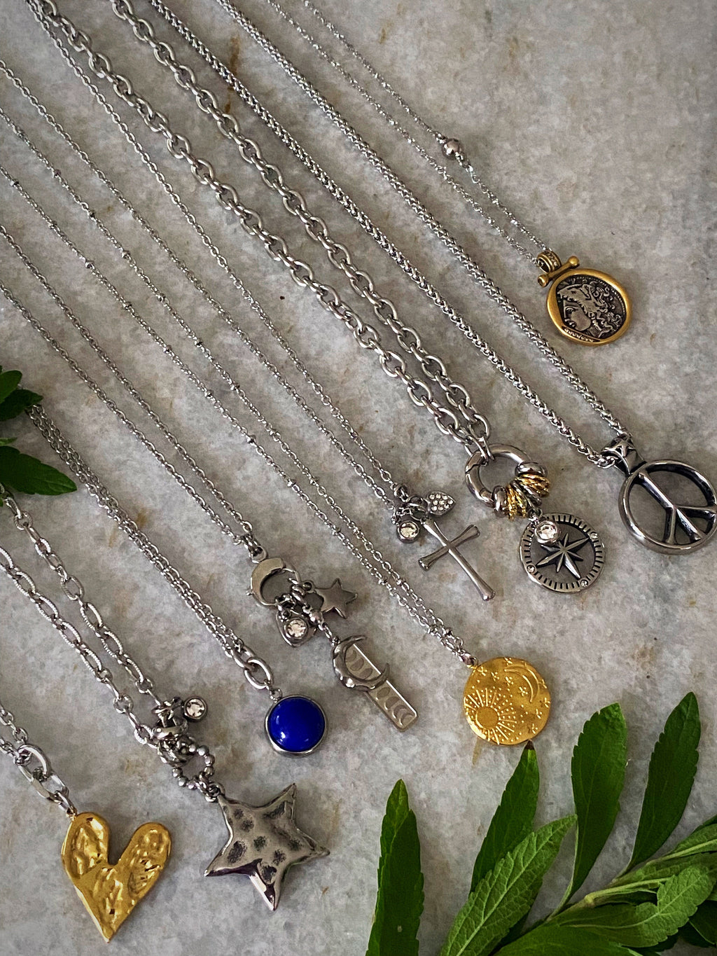 Additional product photo of the Layered Stone Charm Necklace showing the round stone pendant on a fine chain