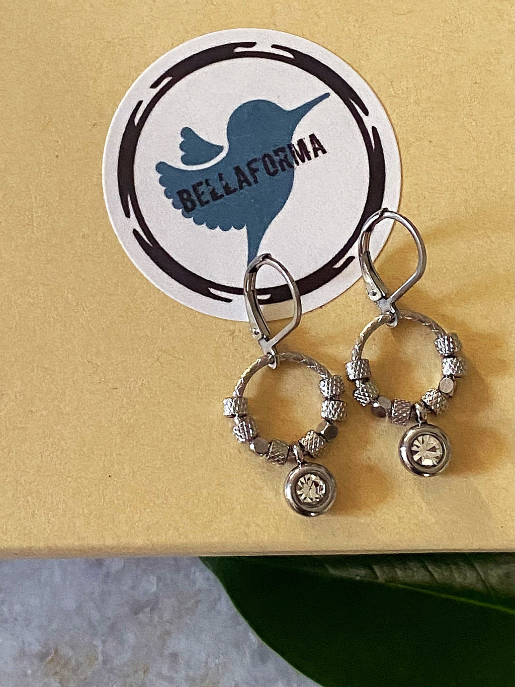 Halo Shimmer Rhinestone Earrings on a display card
