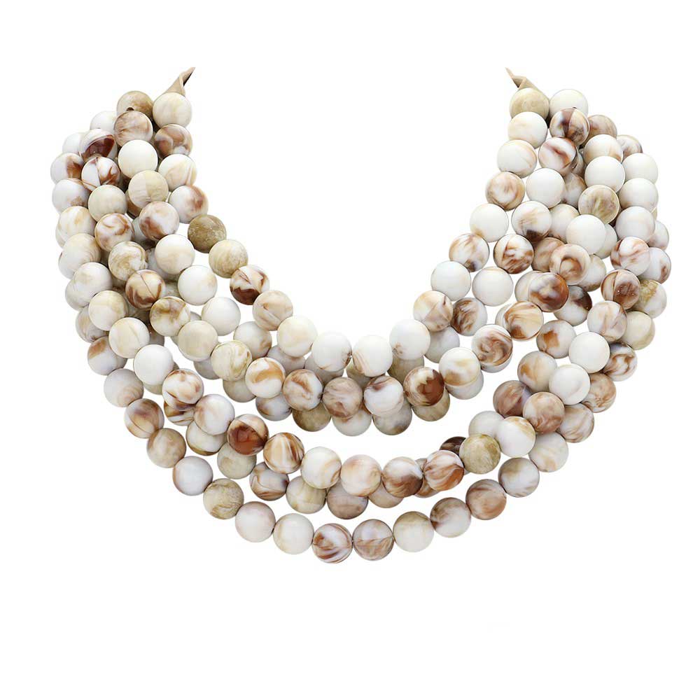 Chunky multi-strand beaded statement necklace shown in an additional colorway on a display form