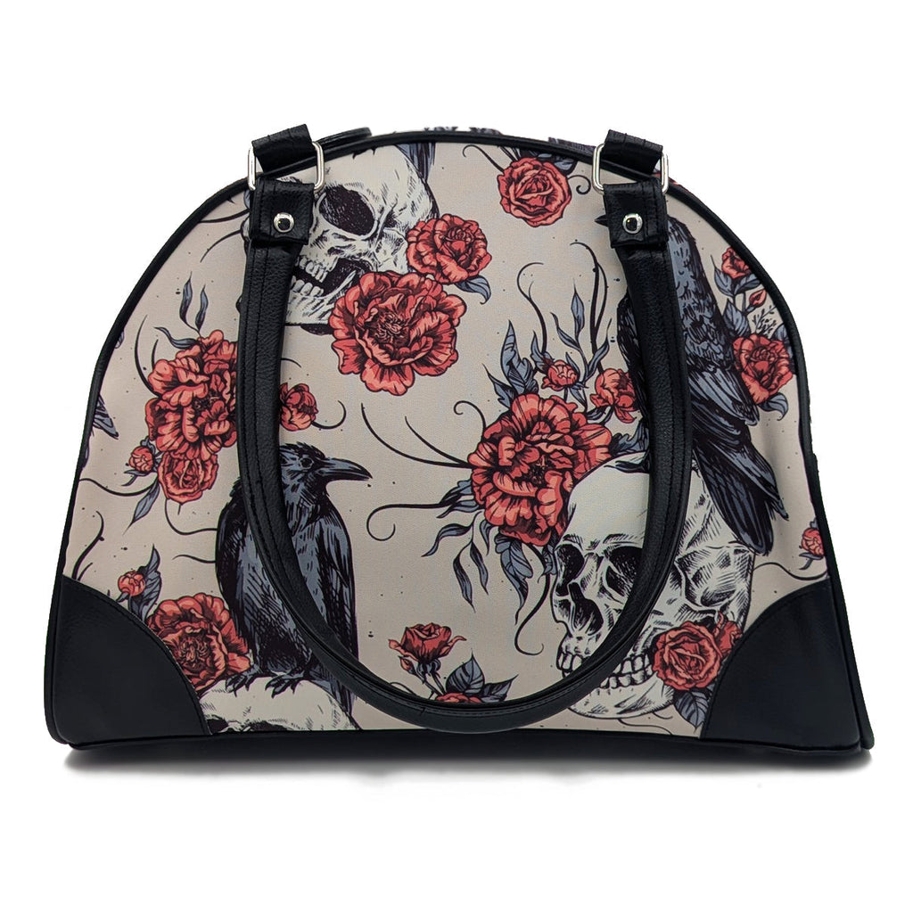 A Murder of Crows purse with skull and rose print