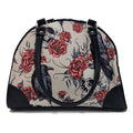 A Murder of Crows purse with skull and rose print