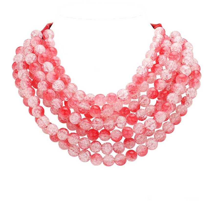 Chunky multi-strand beaded statement necklace shown in an additional colorway on a display form