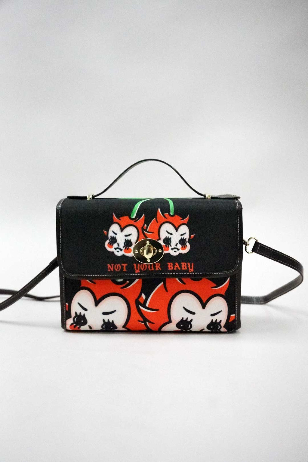 Not Your Baby purse shown from the side