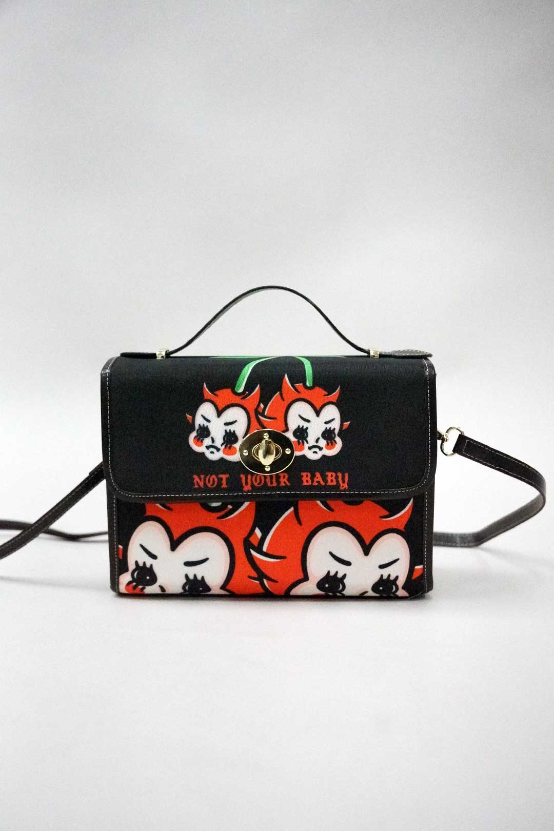Not Your Baby purse shown from the side