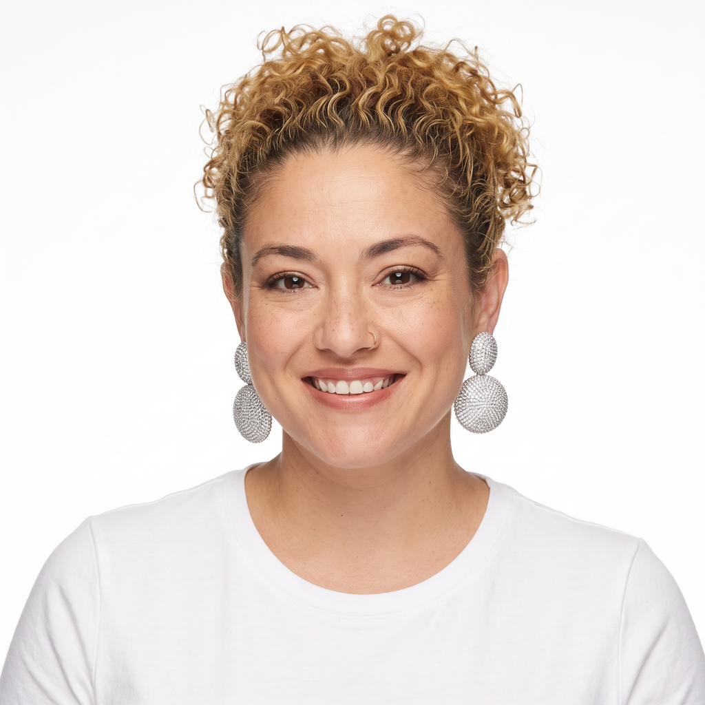 Dopamine Alley double disc statement earrings featuring shimmering pavé rhinestones worn by a smiling woman.