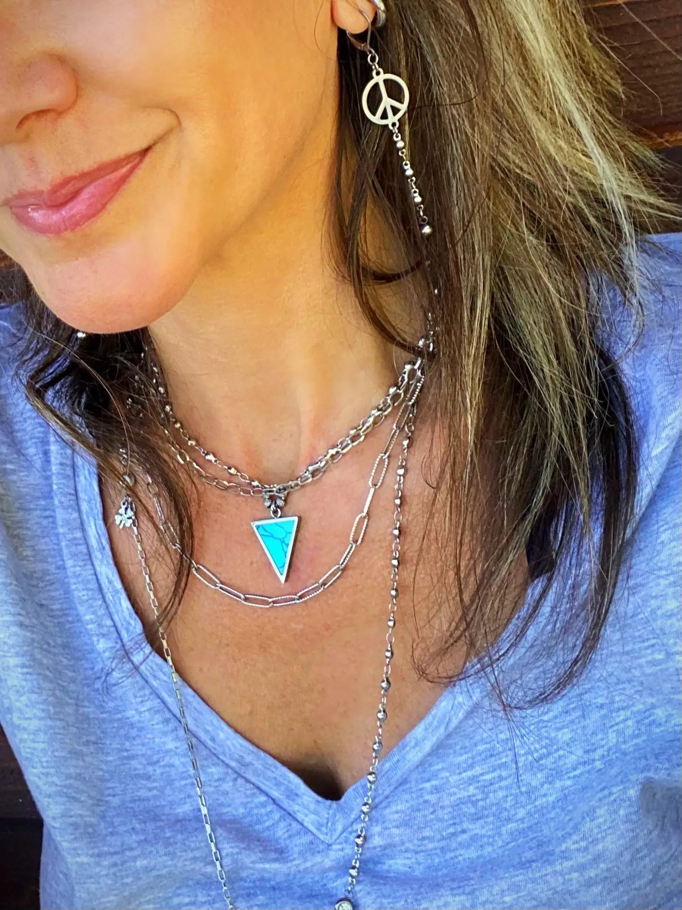 Additional product photo of the Peace Sign Drop Earrings showing the peace sign charm and beaded chain drop
