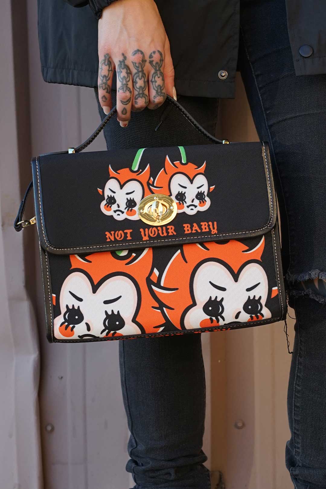 Not Your Baby canvas purse front view with cherub print